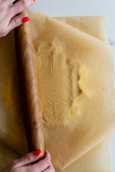 Cookie dough rolled out.