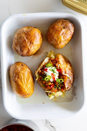 Chakalaka baked potato with cheddar and sour cream.