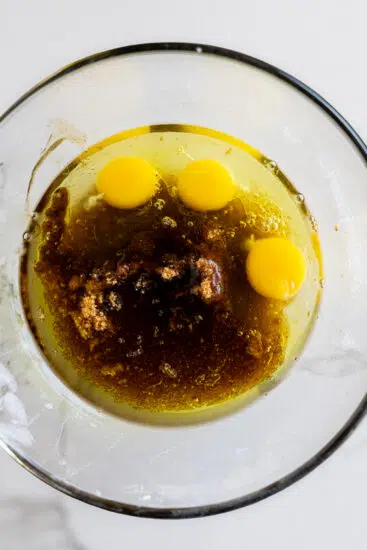 Wet ingredients for carrot cake in mixing bowl