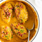 Smothered chicken with crispy bacon