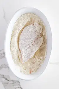 Chicken breasts coated in seasoned flour