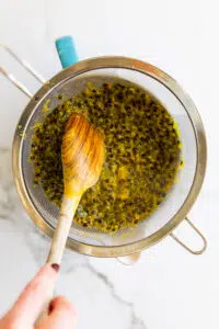 Passion fruit syrup passed through a sieve to remove seeds.