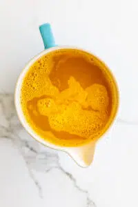 Passion Fruit Syrup in large jug.