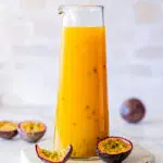 Passion Fruit Syrup in glass jug.
