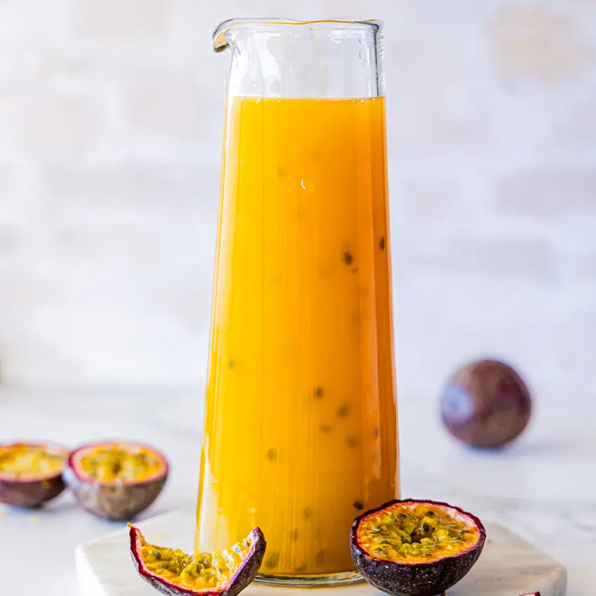 Passion Fruit Syrup in glass jug.