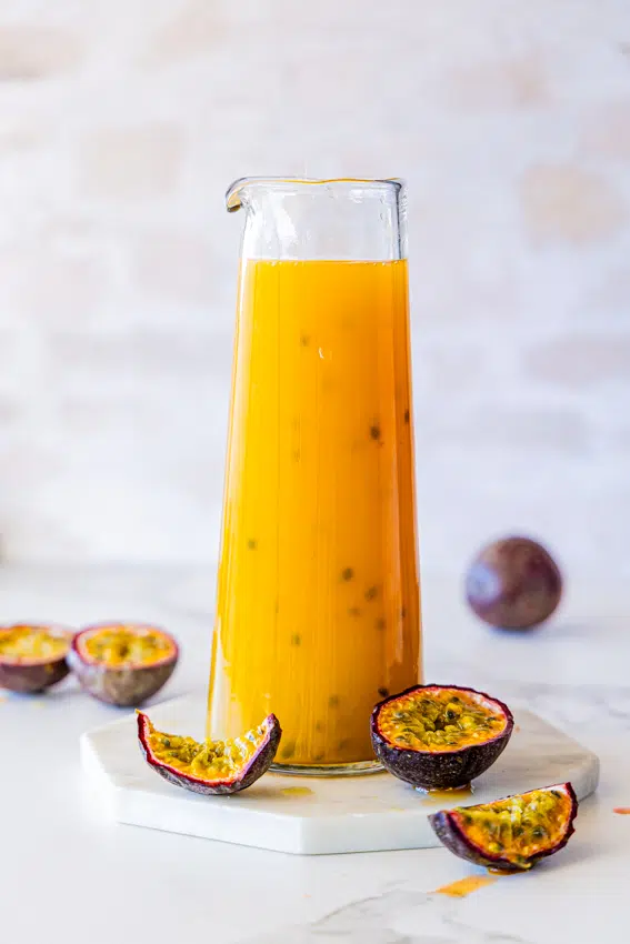 Passion Fruit Syrup in glass jug.