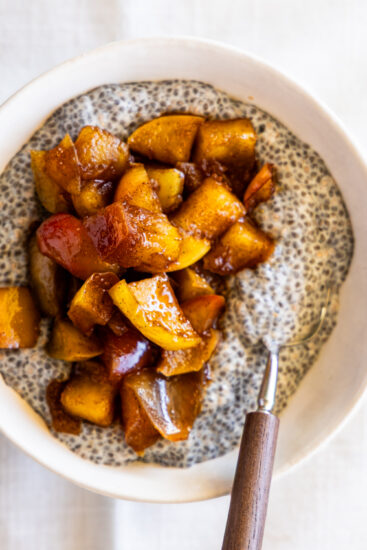 Stewed apples with chia pudding in a serving bowl.
