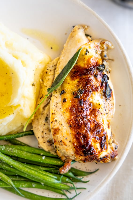 Buttermilk roast chicken with mashed potatoes and green beans.