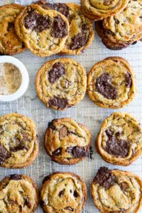 Chocolate chunk cookies on a wire rack.