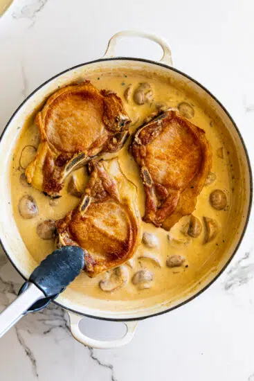 Pork chops added to mushroom gravy.