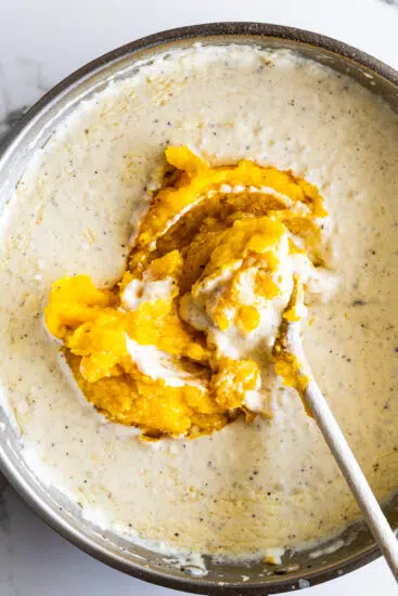 Butternut squash stirred into bechamel sauce.
