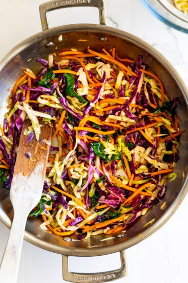 Stir fried vegetables in pan.