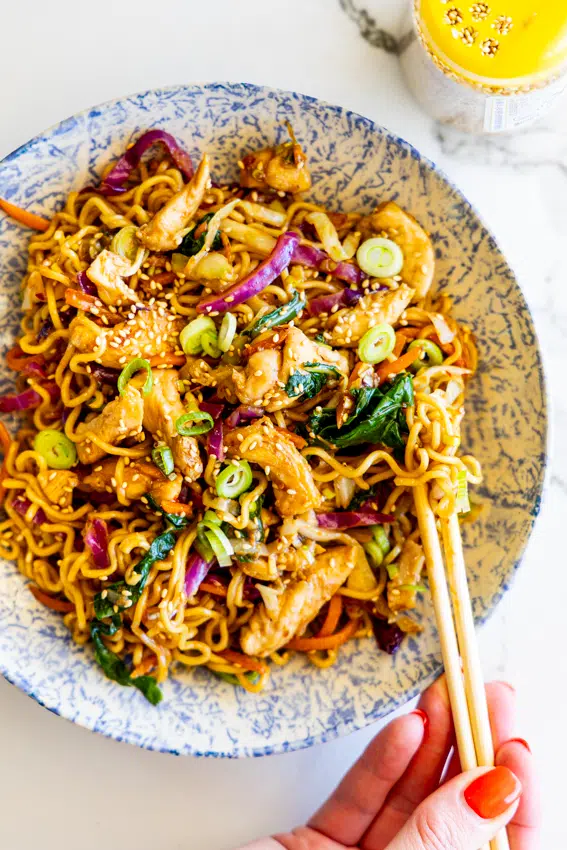 Chicken stir fry with noodles, cabbage and stir fry sauce.