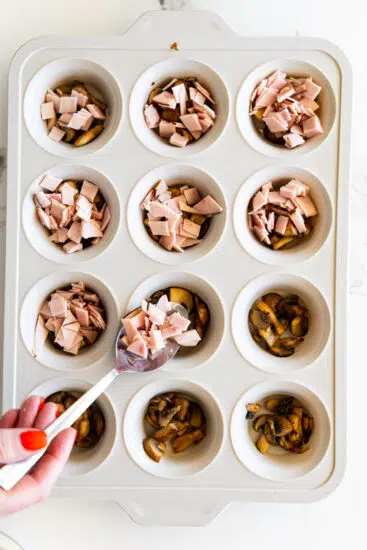 Gypsy ham placed into muffin pan.