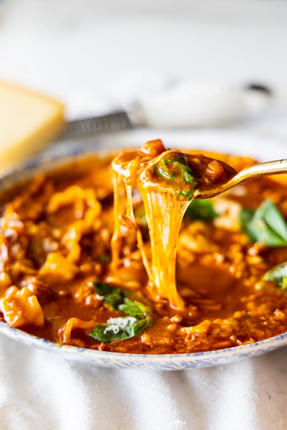 Cheesy lasagna soup in serving bowl.