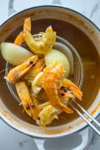 Seafood stock with shrimp shells.