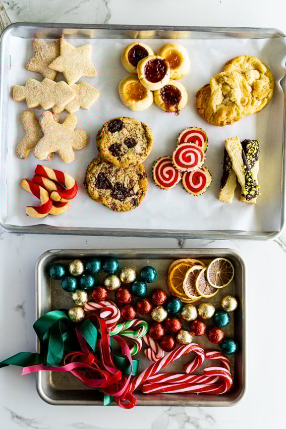 Baked cookies and extra decorations ready to be packed into gift boxes.