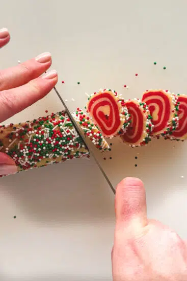 Pinwheel cookies sliced with sharp knife.