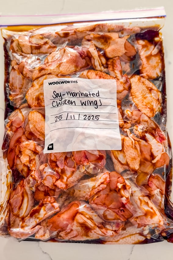 Soy marinated chicken wings in a freezer bag.