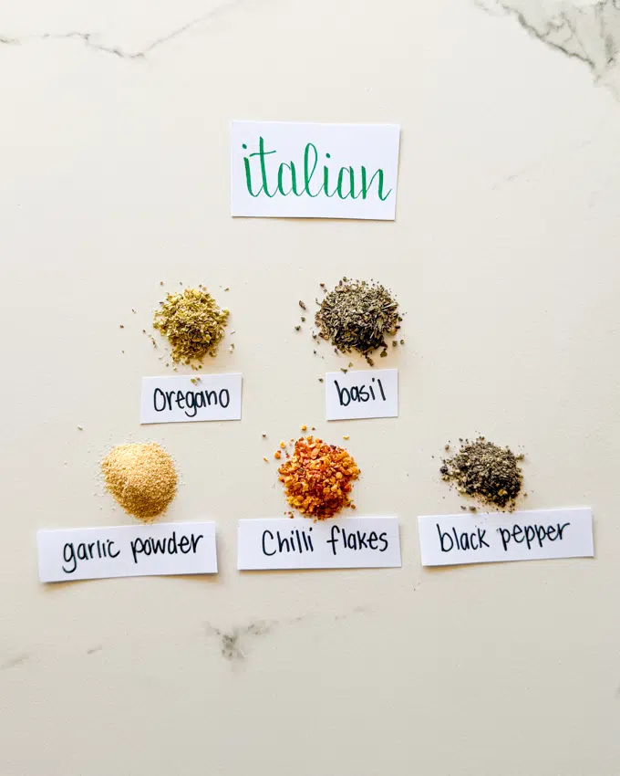 Italian spice mix with oregano, basil, garlic powder, chilli flakes, black pepper.