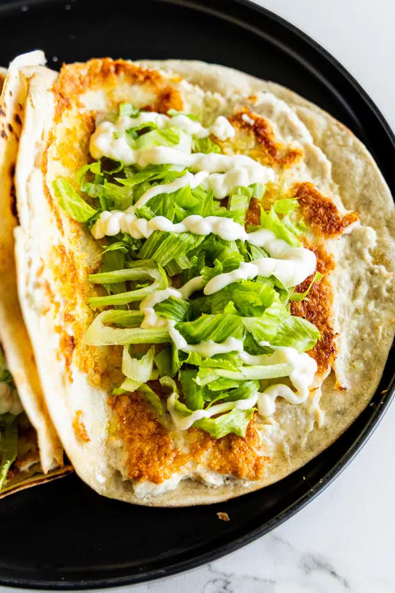 McChicken Smashed Tacos with lettuce and easy mcchicken sauce.