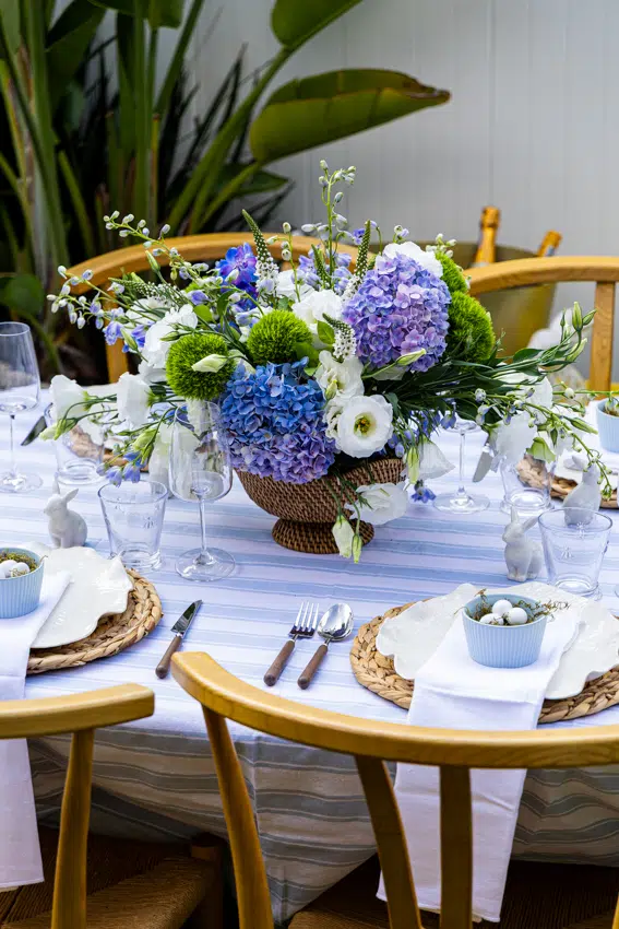 My Easter table with pale blue ad white accents and a classic table setting.