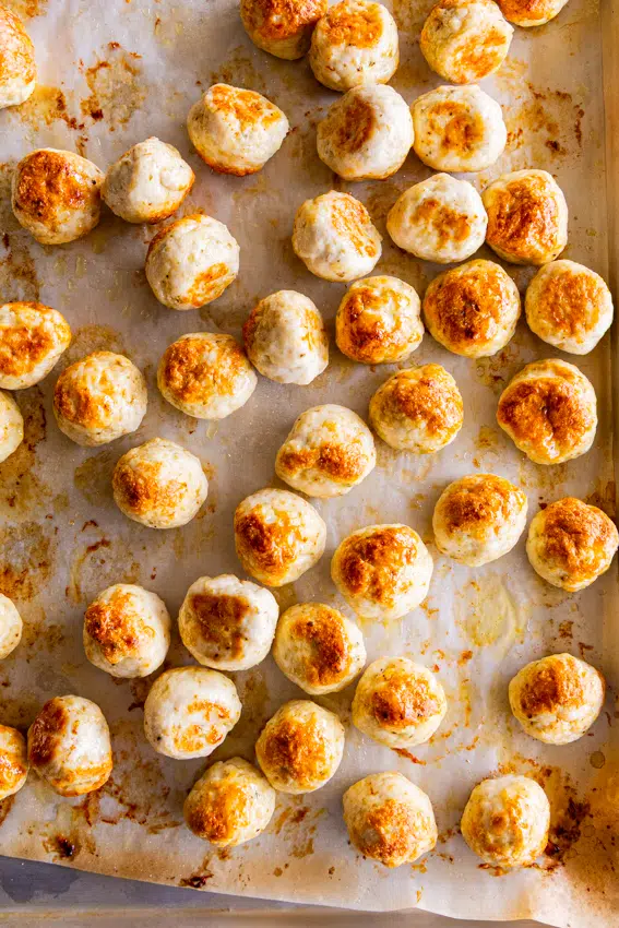 Baked Chicken Meatballs on baking tray.