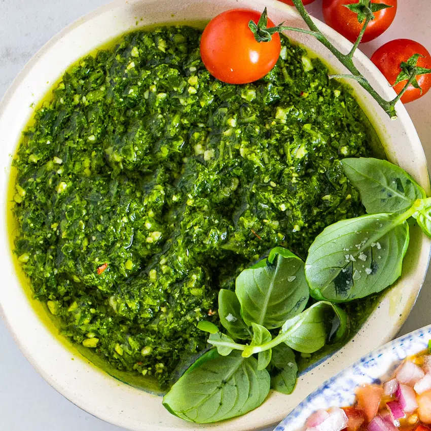 Easy basil pesto made with pine nuts and parmesan cheese.