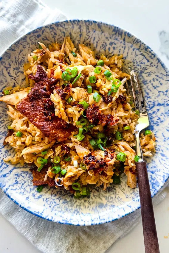 Viral Rotisserie Chicken Rice in a bowl with a fork.