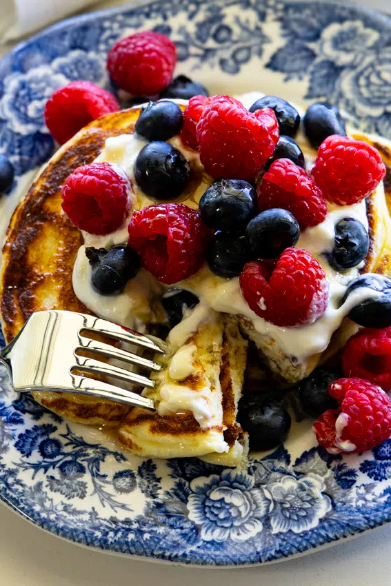 Cottage cheese pancakes served with berries.