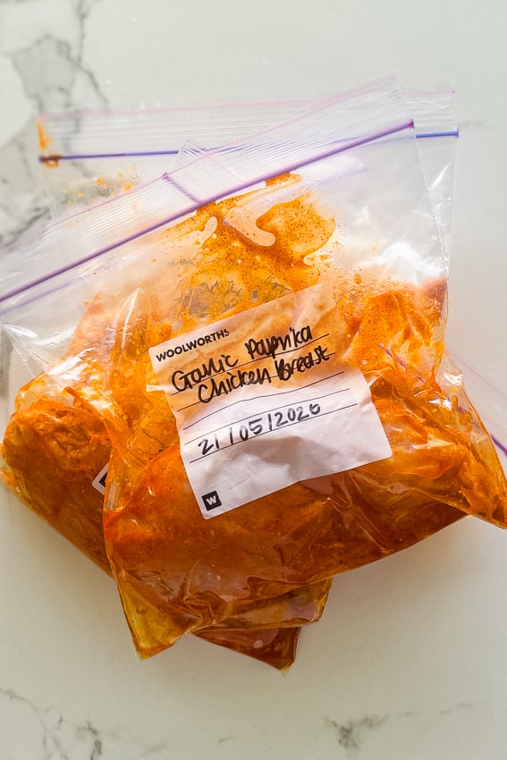 Marinated chicken breast in ziploc bags.