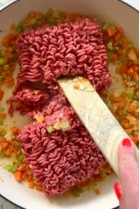 Ground beef browned in pan.