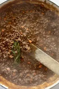 Cooked cottage pie filling.