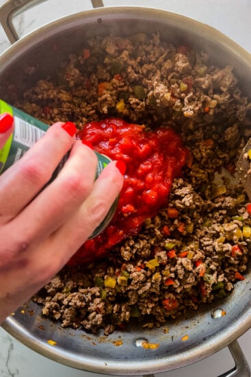 Chopped tomatoes added to chilli con carne.