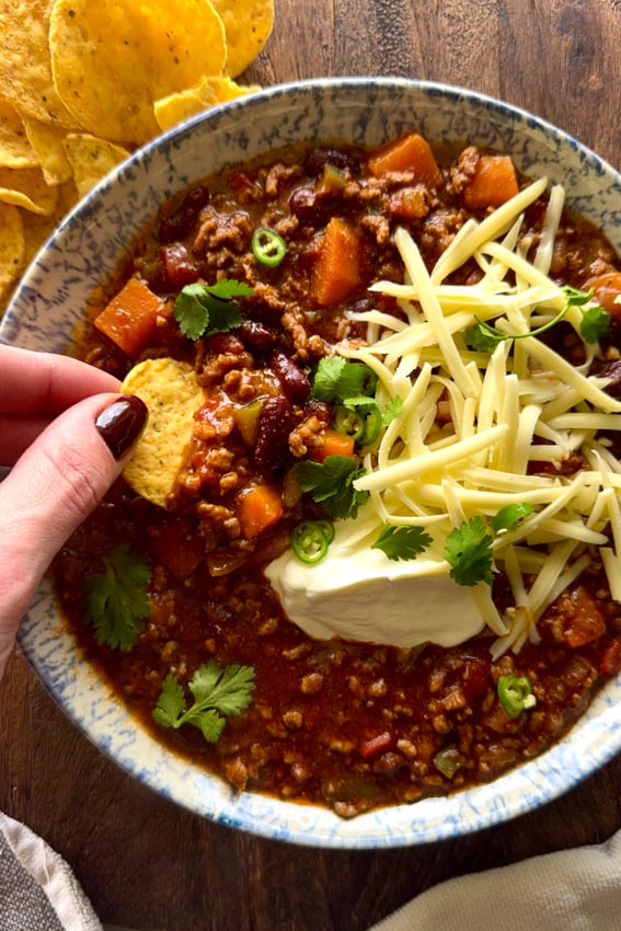 Chilli Con Carne served with corn chips.
