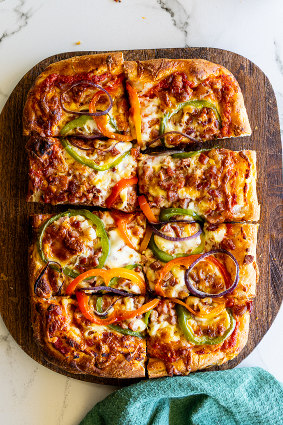 Sheet pan pizza with bacon and peppers