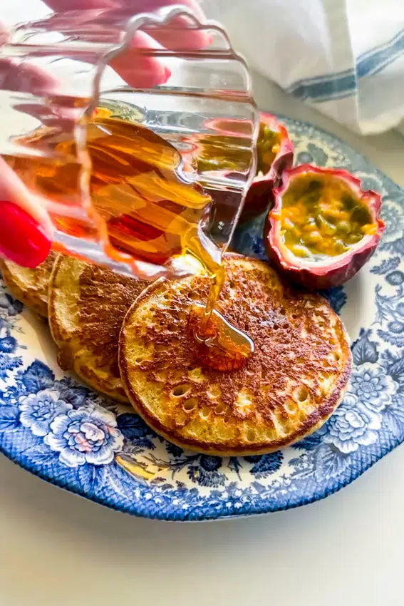Banana oat pancakes with maple syrup.