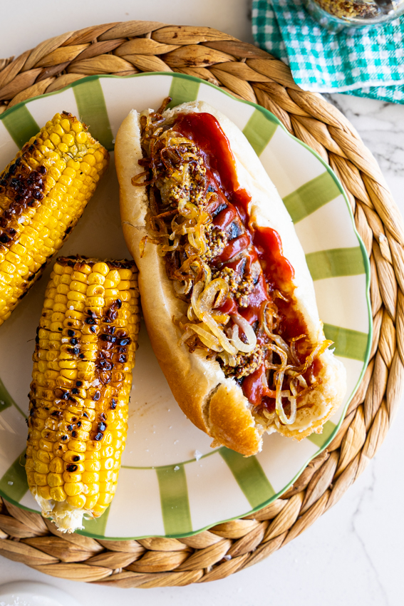 South African Boerewors rolls with corn on the cob.