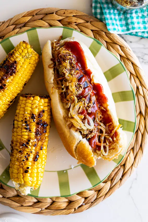 South African Boerewors rolls with corn on the cob.