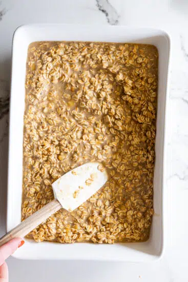 Baked oatmeal batter in baking dish.