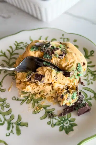 Plated Peppermint Crisp Tart with spoon.