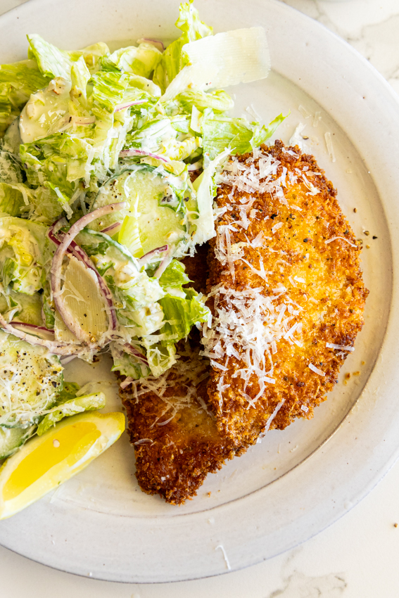 Chicken Milanese with Grinder-style salad.