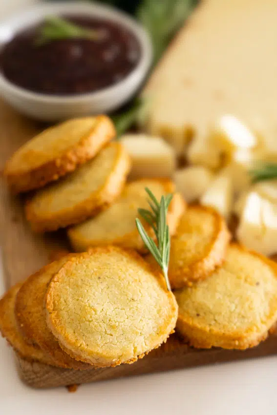 Garlic Parmesan Shortbread Crackers on a cheese board.