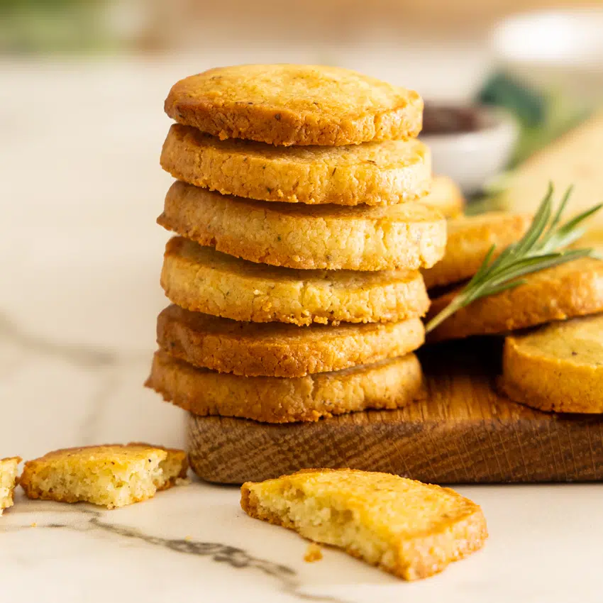 Garlic Parmesan Shortbread Crackers on a cheese board.