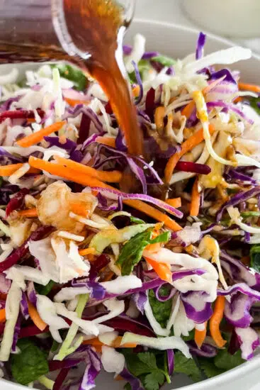 Soy Honey Salad Dressing poured over slaw.