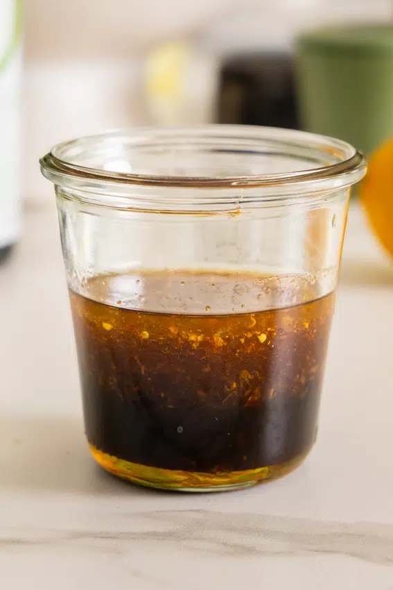 Soy Honey Salad Dressing in a glass jar.
