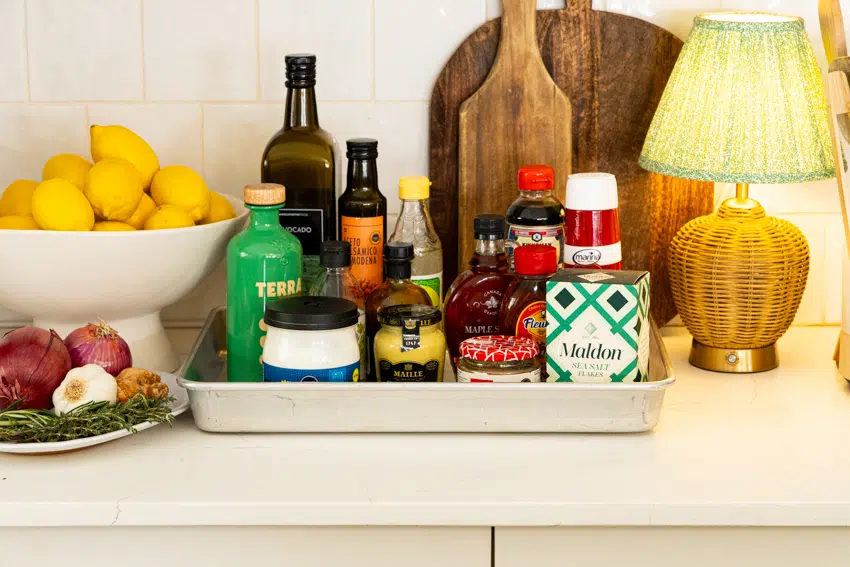 A variety of ingredients for marinades on a kitchen counter.